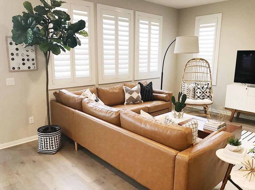 Comfortable living room with our Polywood shutters in San Jose.